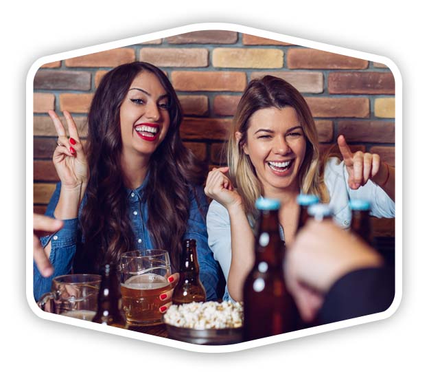 women-bar-whiteback two women enjoying Singo Music Bingo Games