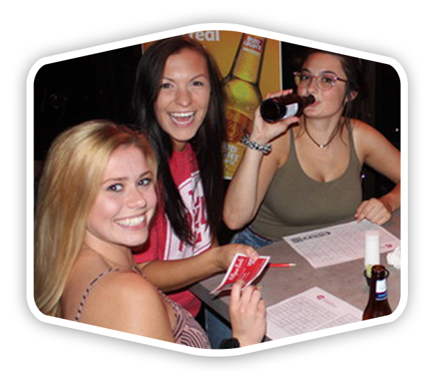 women-playing-trivia-trans-back Three women playing trivia in a bar